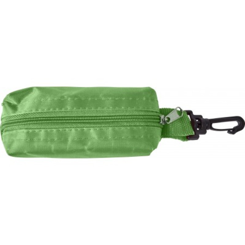Eight pencils, pencil sharpener and pouch