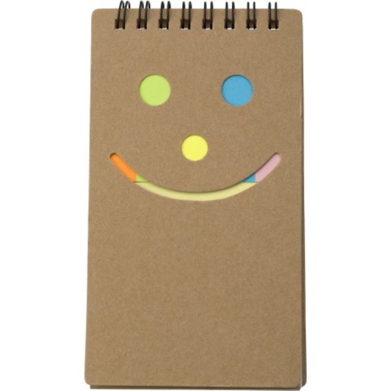 Notebook with sticky notes.